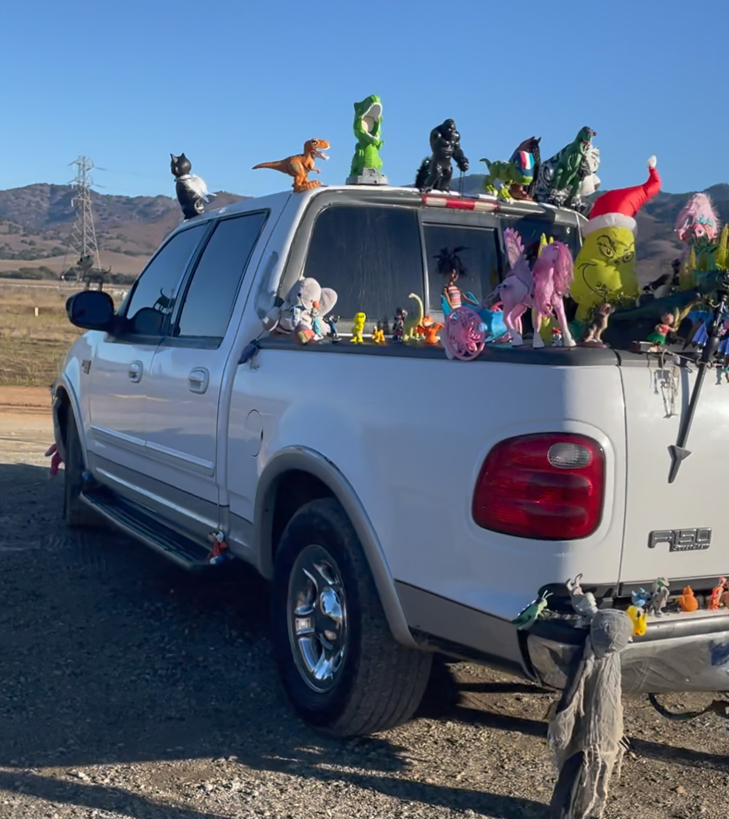 White truck decorated with toys